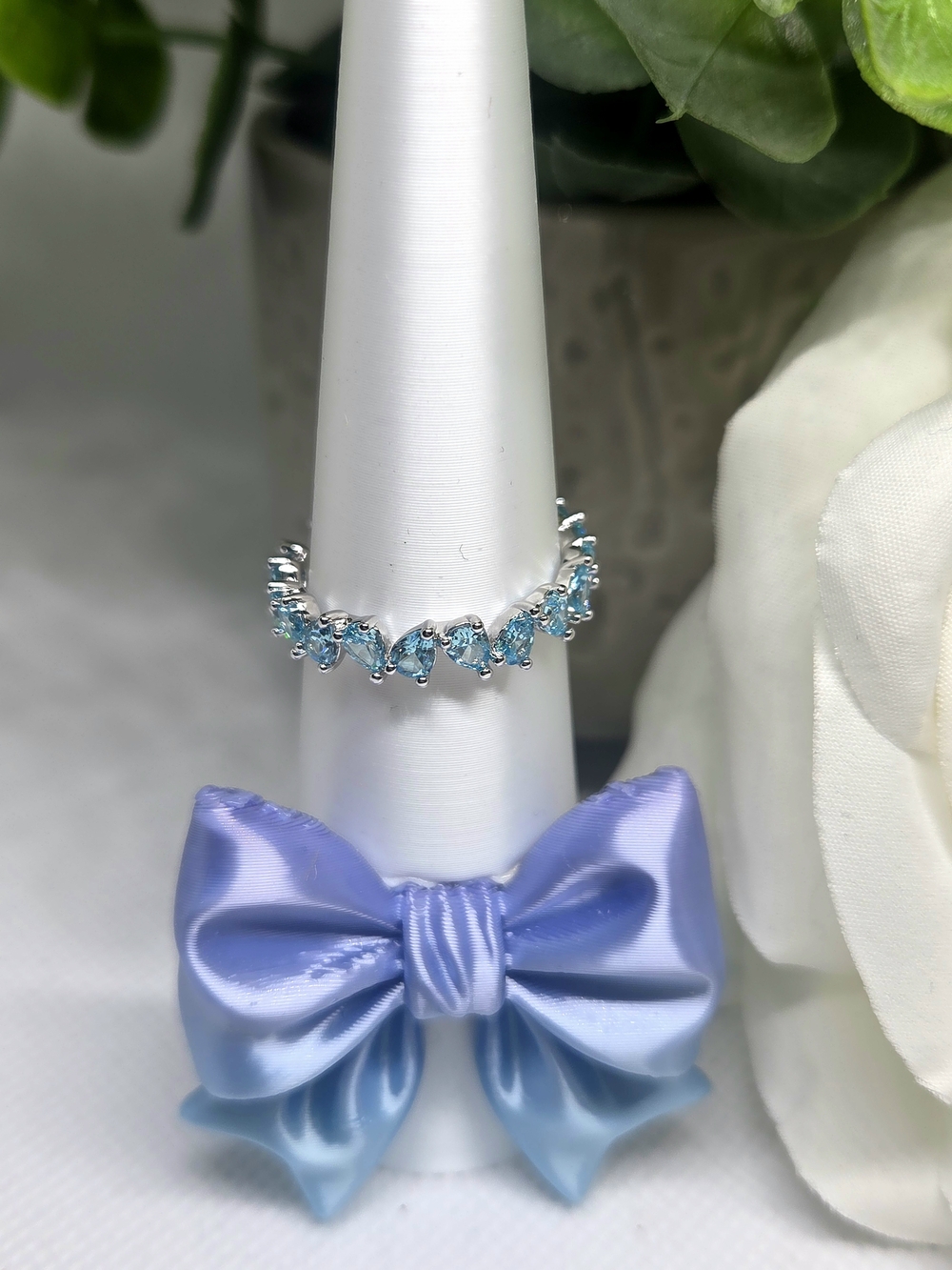 BP Blue Topaz CZ Teardrop Band On Rhodium Plating